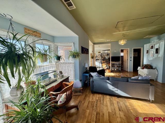 living room with hardwood / wood-style flooring