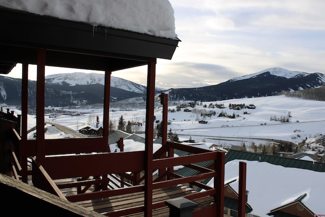 view of dock featuring a mountain view