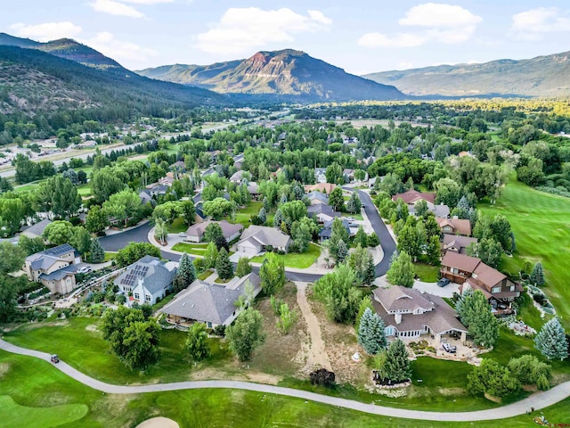 drone / aerial view featuring a mountain view