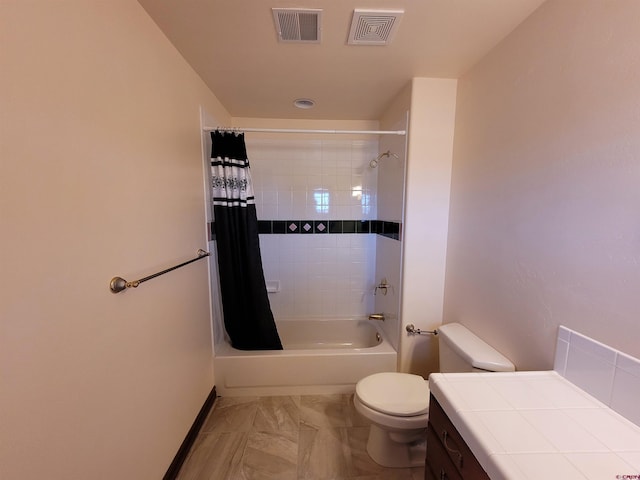 bathroom featuring toilet and shower / bath combo