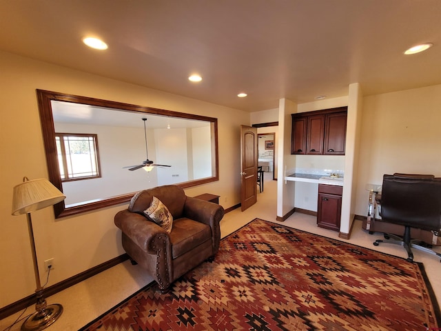 living room featuring ceiling fan and light carpet