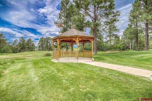 view of community with a gazebo and a lawn