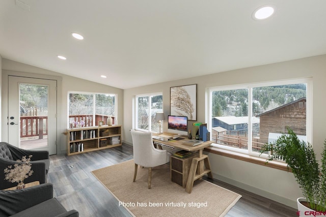 office area featuring hardwood / wood-style floors and lofted ceiling