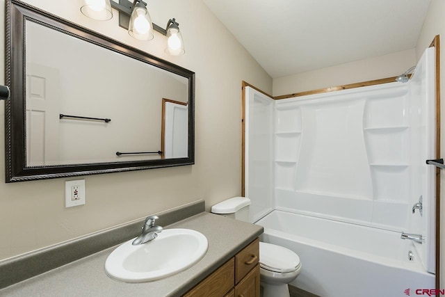 full bathroom featuring vanity, toilet, and tub / shower combination