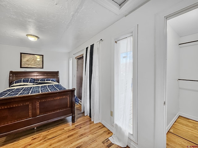 bedroom featuring light hardwood / wood-style floors