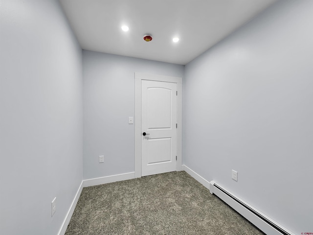 carpeted spare room featuring baseboards, a baseboard heating unit, and recessed lighting