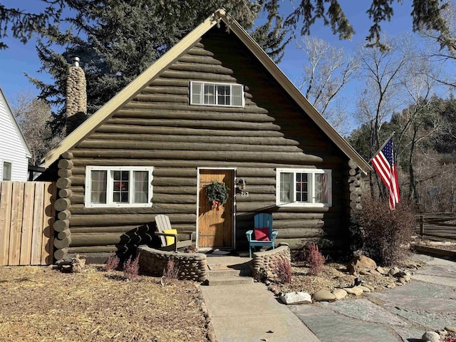 view of log cabin