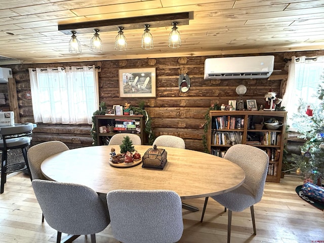 dining room featuring plenty of natural light, wood ceiling, a wall mounted air conditioner, and light hardwood / wood-style flooring