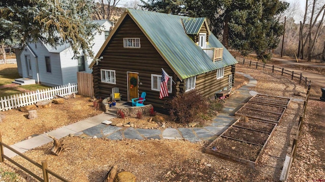 view of log cabin