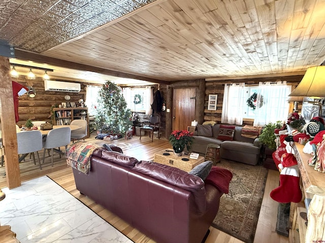 living room featuring light hardwood / wood-style floors, an AC wall unit, and wooden ceiling