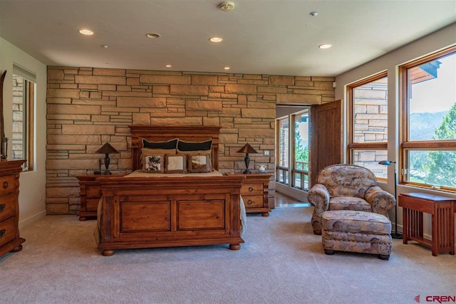 carpeted bedroom featuring radiator and multiple windows