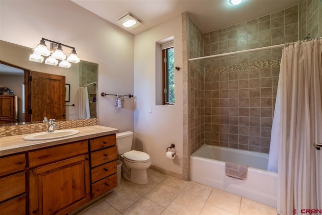 full bathroom with tile patterned floors, vanity, toilet, and shower / bath combo