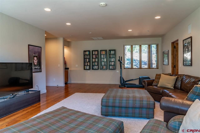 living room with hardwood / wood-style flooring