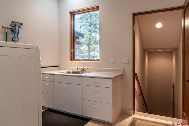 bathroom featuring washer / dryer and vanity