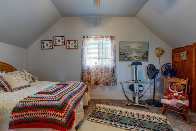 bedroom with carpet flooring and vaulted ceiling