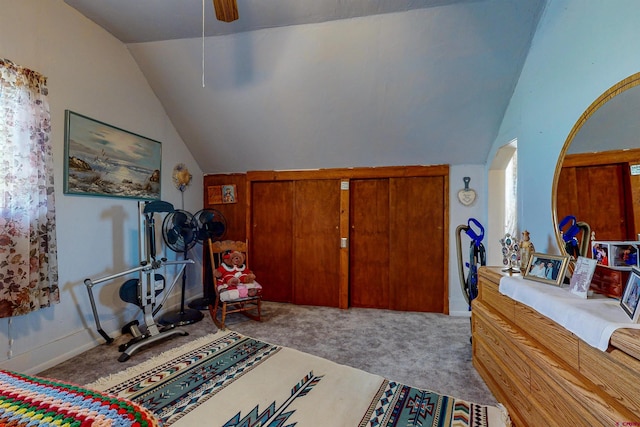 bedroom with light carpet, ceiling fan, and lofted ceiling