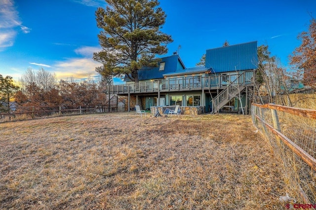 rear view of house with a deck