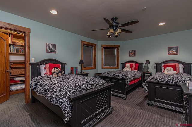 carpeted bedroom with ceiling fan