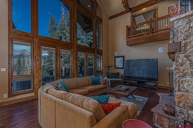 living room with french doors, high vaulted ceiling, and dark wood-type flooring