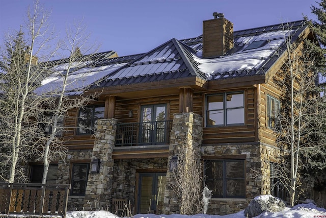 view of snow covered property