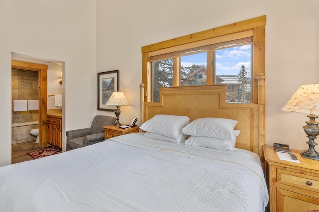 bedroom featuring ensuite bathroom