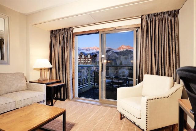 living area featuring a mountain view