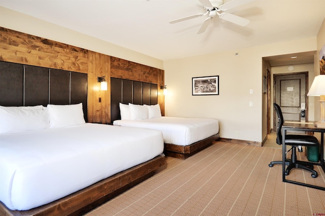 bedroom featuring carpet and ceiling fan