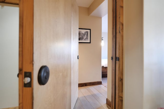 corridor featuring light wood-type flooring