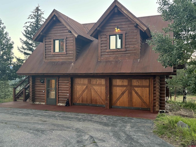 cabin with a garage