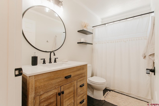 bathroom with tile patterned floors, vanity, toilet, and ornamental molding