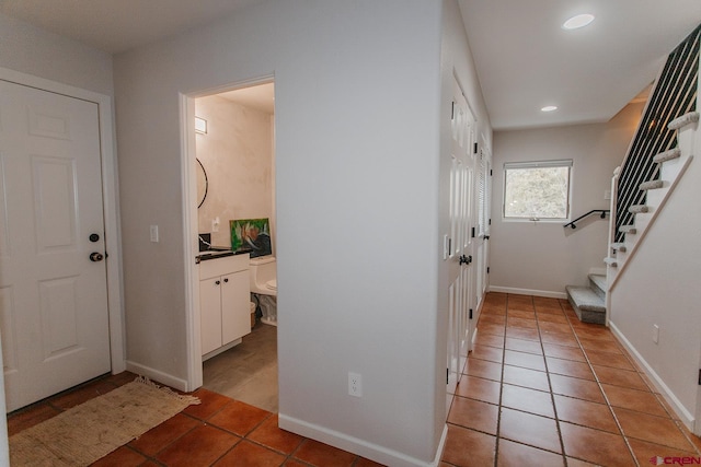 foyer entrance featuring tile patterned flooring