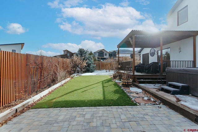 view of yard with a deck, a pergola, a patio, and a hot tub