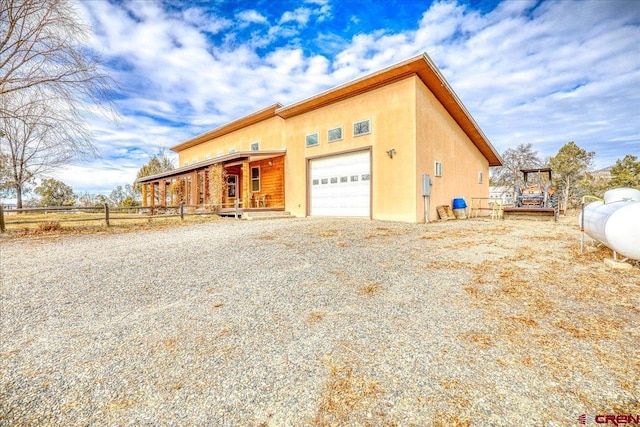 view of front of property featuring a garage