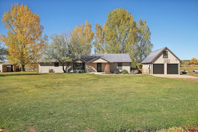 ranch-style house with a garage and a front lawn