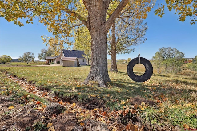 view of yard with a rural view