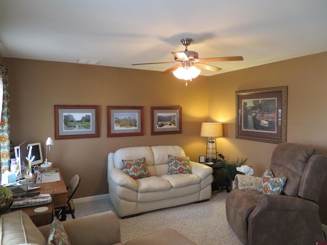 living room with carpet and ceiling fan