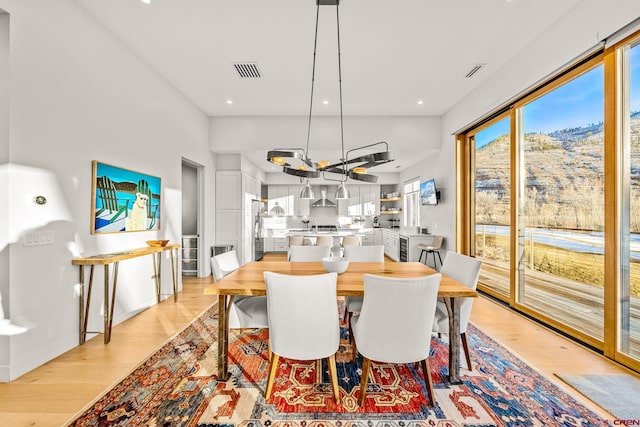 dining area with light wood-type flooring