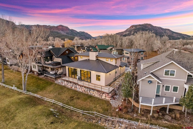 aerial view at dusk with a mountain view