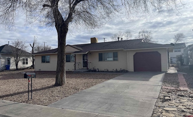 ranch-style home with a garage