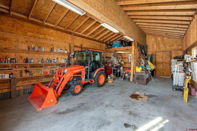 garage with a workshop area