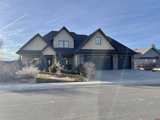 view of front of property with a garage