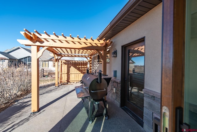 view of patio / terrace featuring a pergola and grilling area