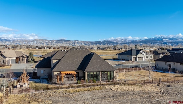 exterior space featuring a mountain view