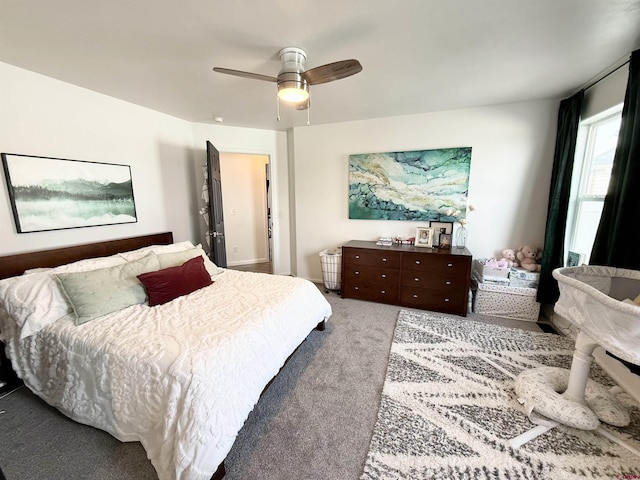 bedroom featuring ceiling fan and light carpet