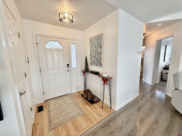 foyer featuring hardwood / wood-style flooring