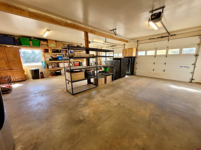 garage featuring a garage door opener