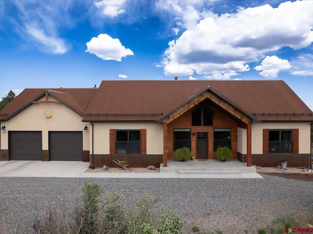 view of front of property with a garage