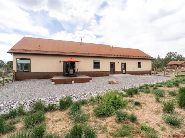 rear view of house featuring a patio