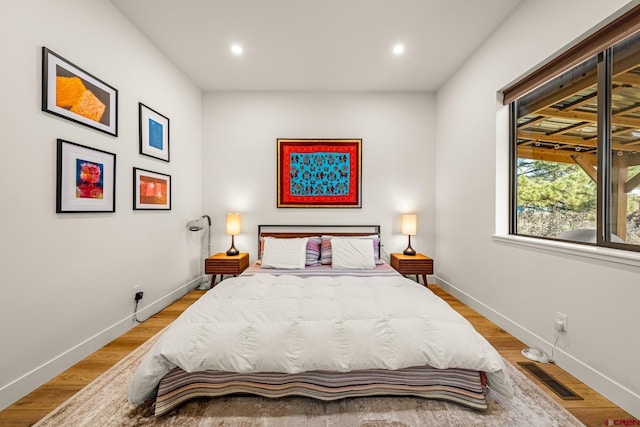 bedroom featuring light hardwood / wood-style flooring