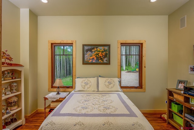 bedroom featuring hardwood / wood-style floors